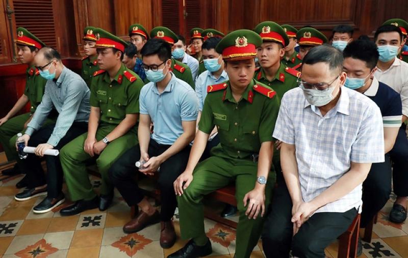 Xét xử cựu giám đốc Trung tâm lý lịch tư pháp quốc gia và 21 bị cáo - Ảnh 1.