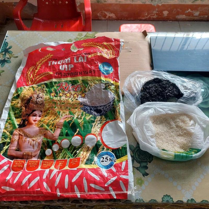 Điều tra vụ nghi gạo giả cháy thành than khi rang- Ảnh 1.