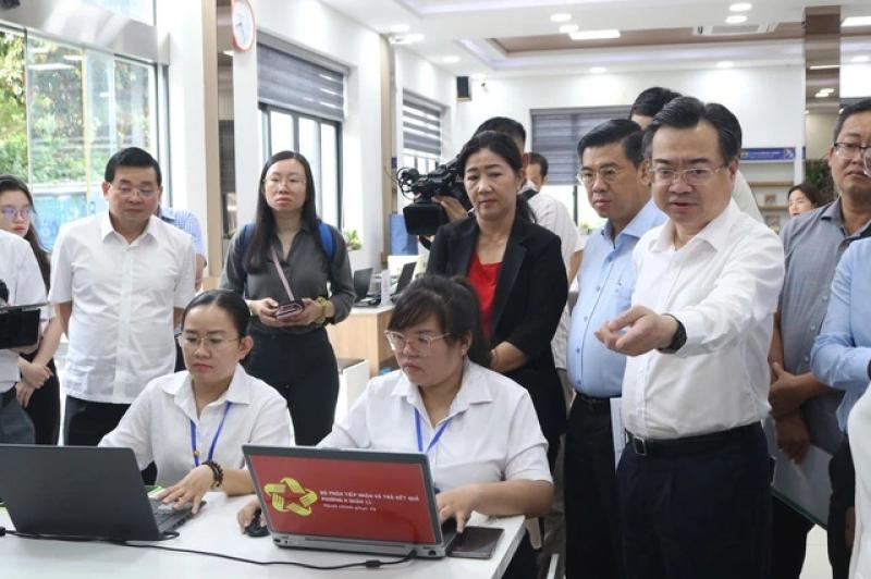 TP.HCM vận hành thử nghiệm chính quyền 2 cấp - Ảnh 1.