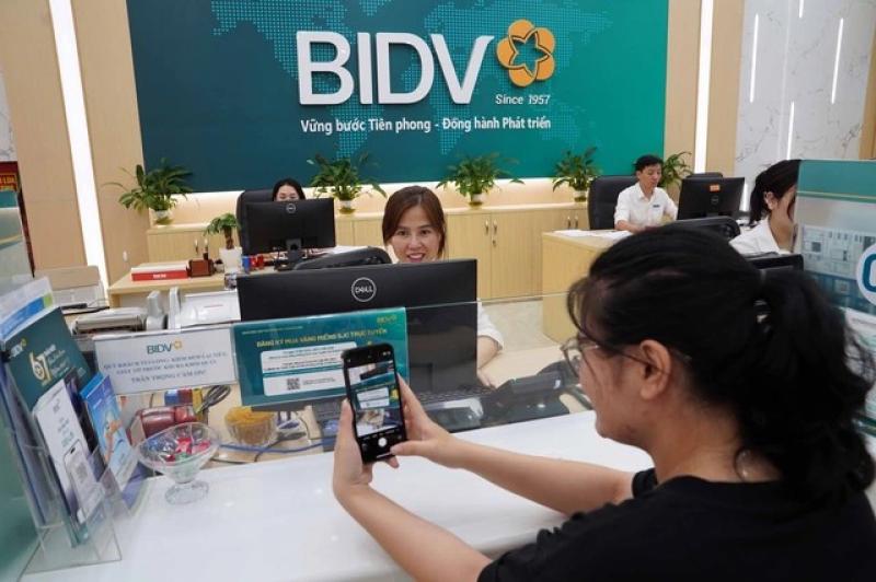 Từ ngày mai 15.7, BIDV ngừng giao dịch đối với tài khoản 14 số - Ảnh 1.
