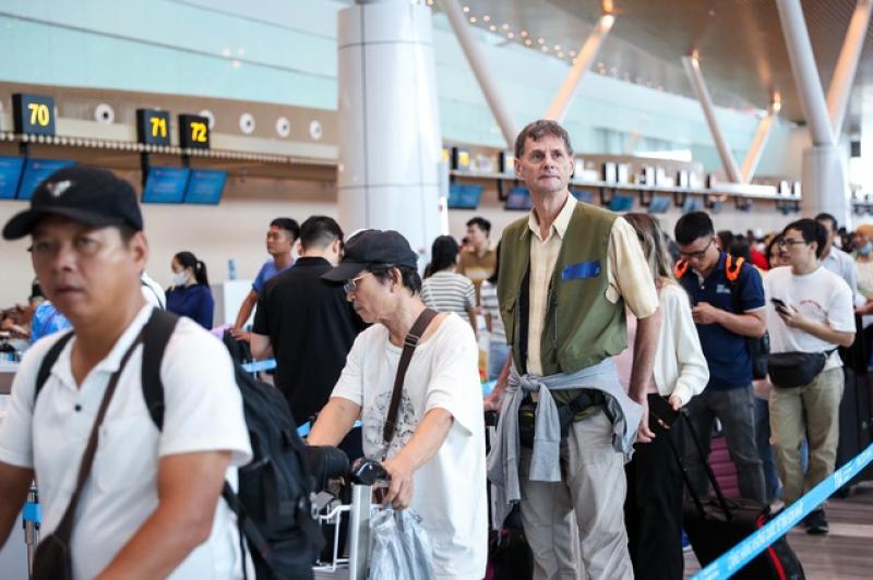 Làm thủ tục bay không giấy tờ tại nhà ga T3 - Ảnh 9.