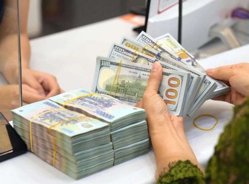 Lãi suất tiền đồng liên ngân hàng tăng gần gấp đôi- Ảnh 1.
