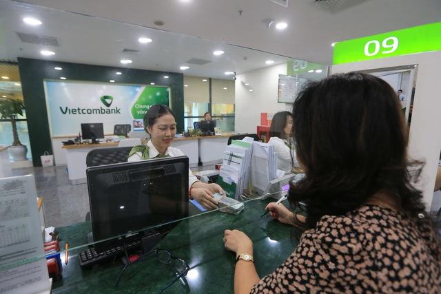 Khách hàng chú ý giờ giao dịch tại ngân hàng dịp diễu binh mừng Quốc khánh 2.9- Ảnh 1.