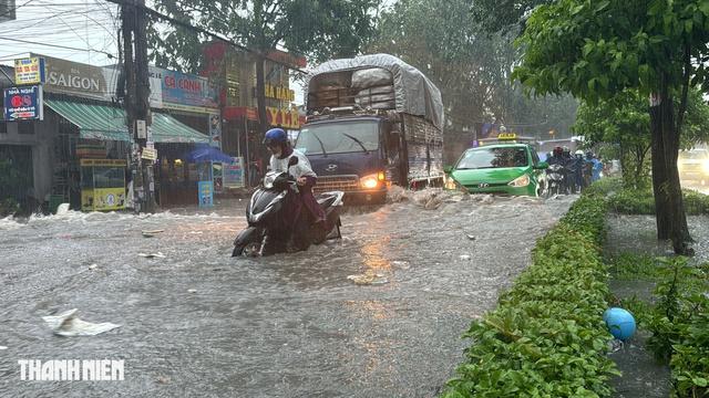 3 bộ phận trên xe máy phải kiểm tra sau khi ‘lội’ nước mùa mưa bão - Ảnh 1.
