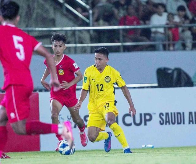 Đội tuyển Malaysia thắng nhọc nhằn chủ nhà Lào, tái đấu ở chảo lửa Bukit Jalil - Ảnh 1. Đội tuyển Malaysia thắng nhọc nhằn chủ nhà Lào, tái đấu ở chảo lửa Bukit Jalil - Ảnh 1.