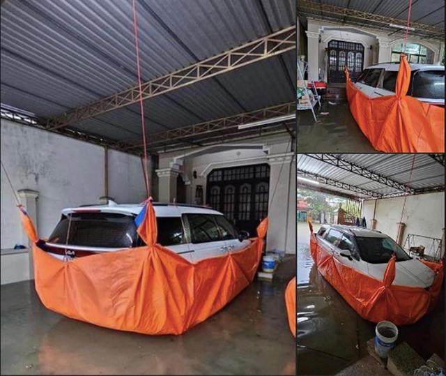 Chịu ảnh hưởng của bão số 10, người dân tìm mọi cách bảo vệ ô tô - Ảnh 5.