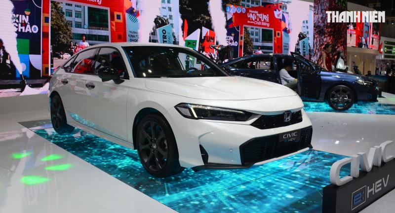 Ô tô hybrid tại Việt Nam rầm rộ 'đua' ưu đãi, giảm giá bán - Ảnh 3.