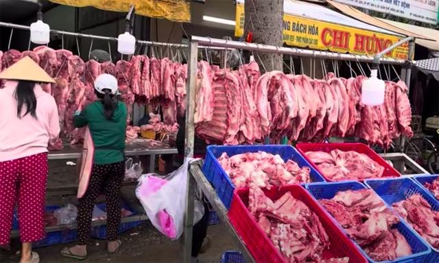 Tết này có thiếu thịt heo?- Ảnh 2.