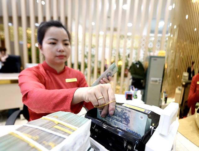 Huy động 'hụt hơi', lãi suất tăng- Ảnh 1. Huy động 'hụt hơi', lãi suất tăng- Ảnh 1.