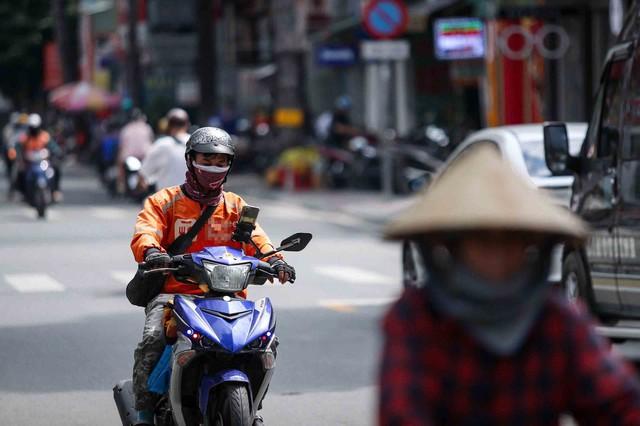 Kiến nghị khóa app tài xế, shipper vi phạm - Ảnh 2.