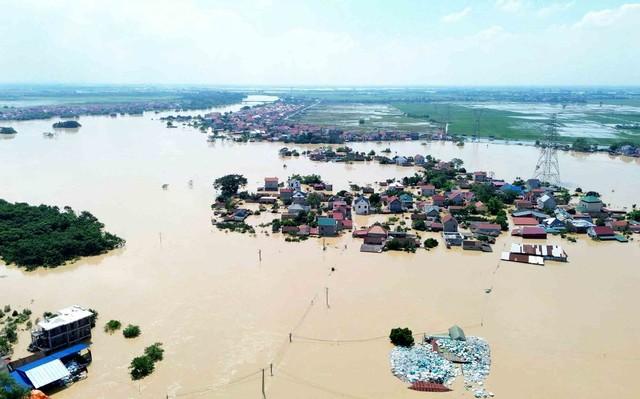 Cần sống chung với lũ Trước khí hậu cực đoan tại miền Bắc việt nam - Ảnh 1. Cần sống chung với lũ Trước khí hậu cực đoan tại miền Bắc việt nam - Ảnh 1.