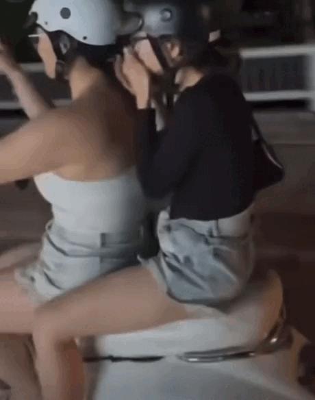 Công an TP.HCM truy tìm cô gái chạy Vespa buông cả 2 tay ở Lái Thiêu- Ảnh 1.