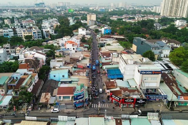 Kẹt mặt bằng, nhiều dự án mở rộng đường ở TP.HCM bị 'thắt cổ chai'- Ảnh 3. Kẹt mặt bằng, nhiều dự án mở rộng đường ở TP.HCM bị 'thắt cổ chai'- Ảnh 3.