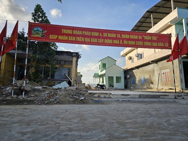 Đắk Lắk quyết tâm bàn giao 606 nhà tránh lũ cho người dân - Ảnh 1.