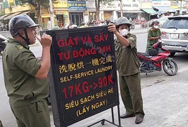 TP.HCM: Xử lý kiên quyết vi phạm vỉa hè, lòng đường ở nhiều tuyến phố- Ảnh 2. TP.HCM: Xử lý kiên quyết vi phạm vỉa hè, lòng đường ở nhiều tuyến phố- Ảnh 2.
