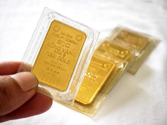 Giá vàng, bạc lập mức cao kỷ lục - Ảnh 1.