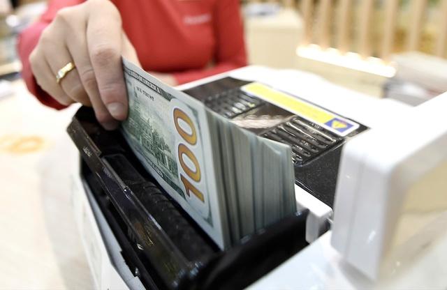 Giá USD hôm nay 22.1.2026: Ngân hàng tăng giá USD kịch trần- Ảnh 1.