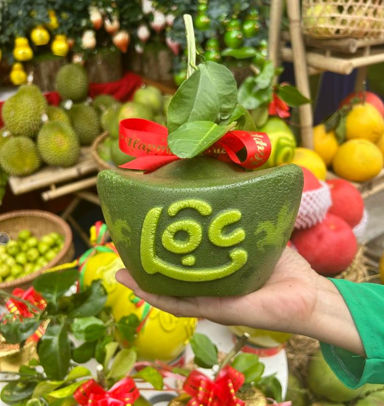 Bưởi mini thỏi vàng tài lộc 'bán bao nhiêu cũng hết' dịp tết - Ảnh 3. Bưởi mini thỏi vàng tài lộc 'bán bao nhiêu cũng hết' dịp tết - Ảnh 3.