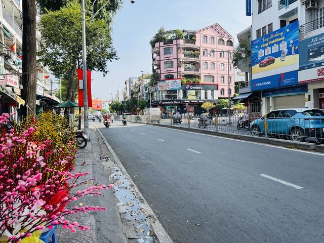 Ngày 28 tết, đường phố TP.HCM thoáng lạ- Ảnh 10. Ngày 28 tết, đường phố TP.HCM thoáng lạ- Ảnh 10.