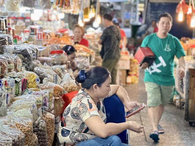 Hộ kinh doanh vẫn thấp thỏm lo bị truy thu- Ảnh 1. Hộ kinh doanh vẫn thấp thỏm lo bị truy thu- Ảnh 1.