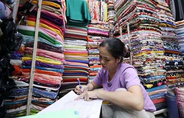 Nâng ngưỡng chịu thuế, hộ kinh doanh kê khai thế nào?- Ảnh 1.