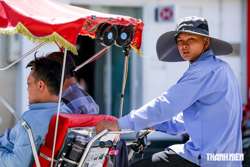 Hà Nội trong ngày nắng nóng đỉnh điểm- Ảnh 5. Hà Nội trong ngày nắng nóng đỉnh điểm- Ảnh 5.