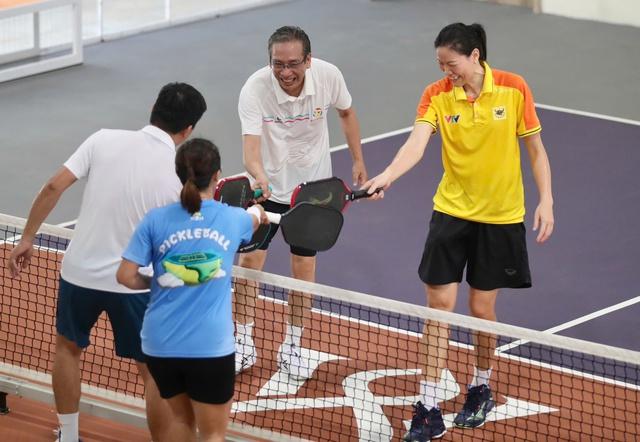 Cựu sao bóng chuyền Ngọc Hoa, Kim Huệ bùng cháy tại giải pickleball Bình Điền Open 2026- Ảnh 2. Cựu sao bóng chuyền Ngọc Hoa, Kim Huệ bùng cháy tại giải pickleball Bình Điền Open 2026- Ảnh 2.